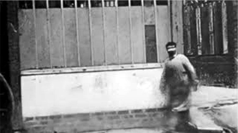 Man Walking Around a Corner image